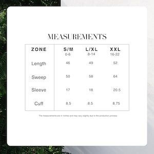 May include: A white background with a table of garment measurements in inches. The table includes measurements for length, sweep, sleeve, and cuff for sizes S/M, L/XL, and XXL. The text "MEASUREMENTS" is at the top.