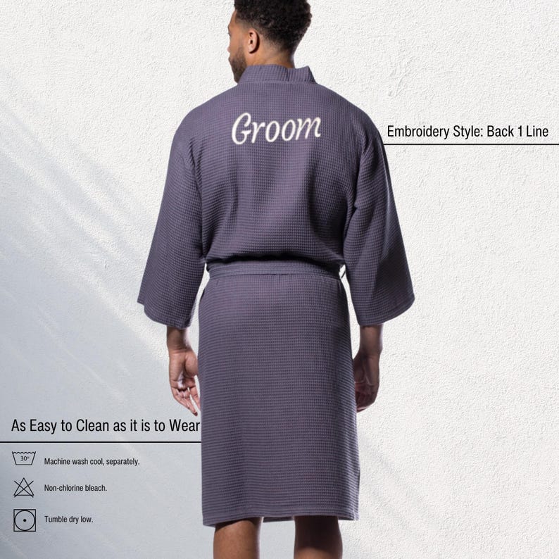 May include: A gray waffle-weave robe with the word "Groom" embroidered on the back. The robe has a belt and kimono-style sleeves. The text "As Easy to Clean as it is to Wear" is also visible.