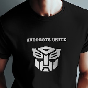 Autobots Unite Iconic Logo Shirt - Classic Transformers Tee - Official Transformers Apparel - Funny Pop Culture T-Shirt - Optimus Prime Top