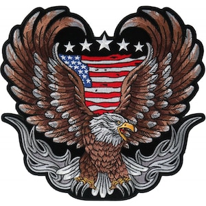 May include: Embroidered patch featuring a bald eagle with wings spread wide, holding an American flag in its talons. The eagle is surrounded by flames and five stars.