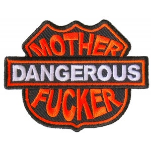 May include: Black and orange embroidered patch with the text "Mother Dangerous Fucker" in a road sign shape.