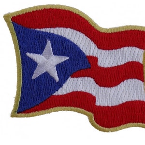 May include: A red, white, and blue embroidered patch of the Puerto Rican flag. The flag is waving and has a white star on a blue field.