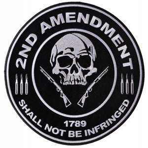 May include: A black and white embroidered patch with a skull and crossbones, two rifles, and the text "2nd Amendment Shall Not Be Infringed 1789".