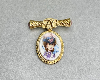 Vintage Avon Portrait Medallion Brooch, Gold Tone Oval Dangle Enameled Porcelain Pendant Pin, Signed Estate Costume Jewelry, Gift for Her.