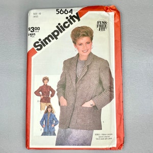 May include: Simplicity sewing pattern number 5664 for a blazer with a houndstooth pattern. The pattern includes instructions for three different styles of blazers. The pattern is labeled "Fuss-Free Fit" and includes a bonus chart on how to work with plaids.