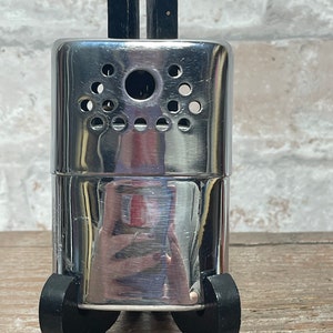 cigarette lighter for arthritic hands Awesome oldtimers with arthritis! Nomatiq is not responsible for damage or injury caused due to improper use. VINTAGE JON-E Handwarmer Hand Warmer