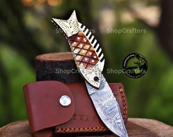 Handmade Damascus Fish Folding Knife: Golden Bolster, Burned Bone Handle, Leather Sheath