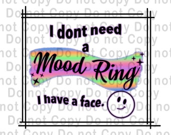 Könnte beinhalten: Grafikdesign mit dem Text "I don't need a Mood Ring, I have a face." Der Text ist schwarz, mit einer regenbogenfarbenen Form hinter den Worten "Mood Ring". Ein Smiley befindet sich unten.