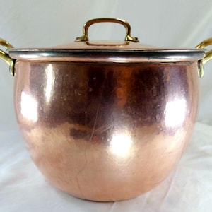 May include: A set of three ceramic mugs with a speckled, matte finish. The mugs are in shades of cream, light gray, and dark gray. Each mug has a simple, minimalist design and a rounded handle. Perfect for coffee or tea.