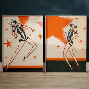 May include: Two vintage-style posters featuring a woman in a black and white striped costume and a top hat. The woman is posed in a dynamic, energetic way, with one poster showing her dancing and the other showing her holding a cane. Both posters have a bright orange star and a white background with black stars.