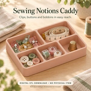 May include: A peach-colored rectangular sewing notions caddy with five compartments containing sewing clips, a measuring tape, bobbins, and a thimble. Text reads: Sewing Notions Caddy, Clips, buttons and bobbins in easy reach, DIGITAL STL DOWNLOAD.