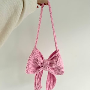 Pink crochet bow bag