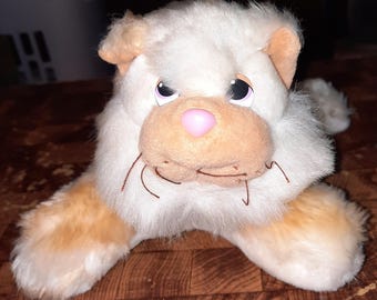 Collectable Fiesta Toy Lying Spaniel stuffed animal. #93380. Great condition. 29.95 + 10.00 shipping.