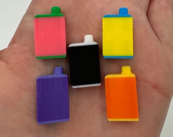 May include: Five small plastic containers in different colors: pink, yellow, black, purple, and orange. Each container has a small spout on top and a slightly raised rim around the top and bottom.