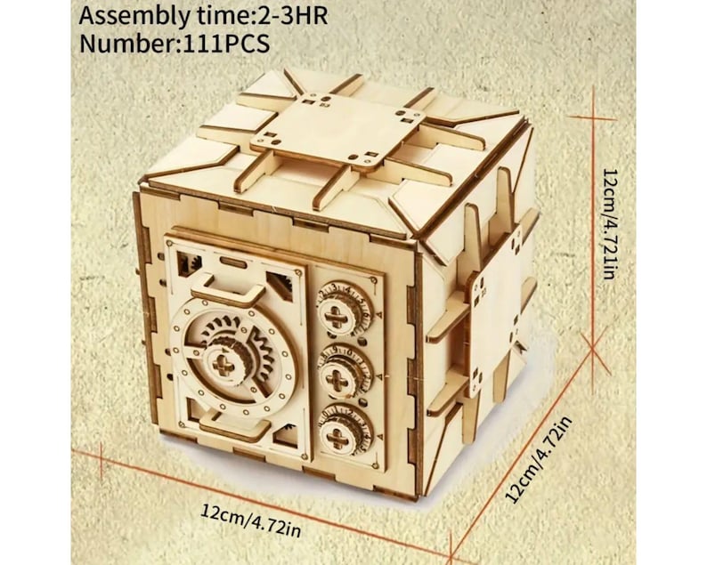May include: A wooden model of a safe with a detailed design, including a handle, a dial, and a lock. The safe is 12 inches in size and requires 111 pieces to assemble. Assembly time is estimated to be 2-3 hours.
