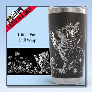 May include: Black tumbler with a detailed white illustration of a playful kitten reaching up. The design includes the text "Kitten Fun Full Wrap" and a smaller image of the kitten with flowers. The tumbler has a silver rim and base.