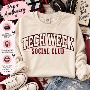 May include: A cream-coloured crewneck sweatshirt featuring the maroon text TECH WEEK SOCIAL CLUB arched across the chest. The garment has long sleeves, a ribbed collar, and a Comfort Colors brand label on the inside of the neckline.
