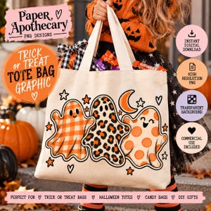 May include: A cream-coloured canvas tote bag featuring a graphic of three ghosts. The left ghost has an orange gingham pattern, the middle ghost has a leopard print, and the right ghost has orange polka dots. An orange crescent moon and stars surround them.