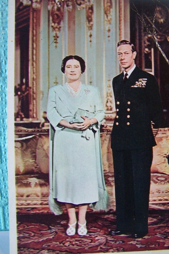 sachin and babi light blue dress Queen Elizabeth uses sword to cut a cake during royal engagement: 'This is  more unusual' main image 0