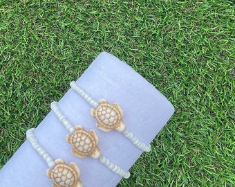 ¡Pulsera de cuentas de semillas de tortuga blanca!