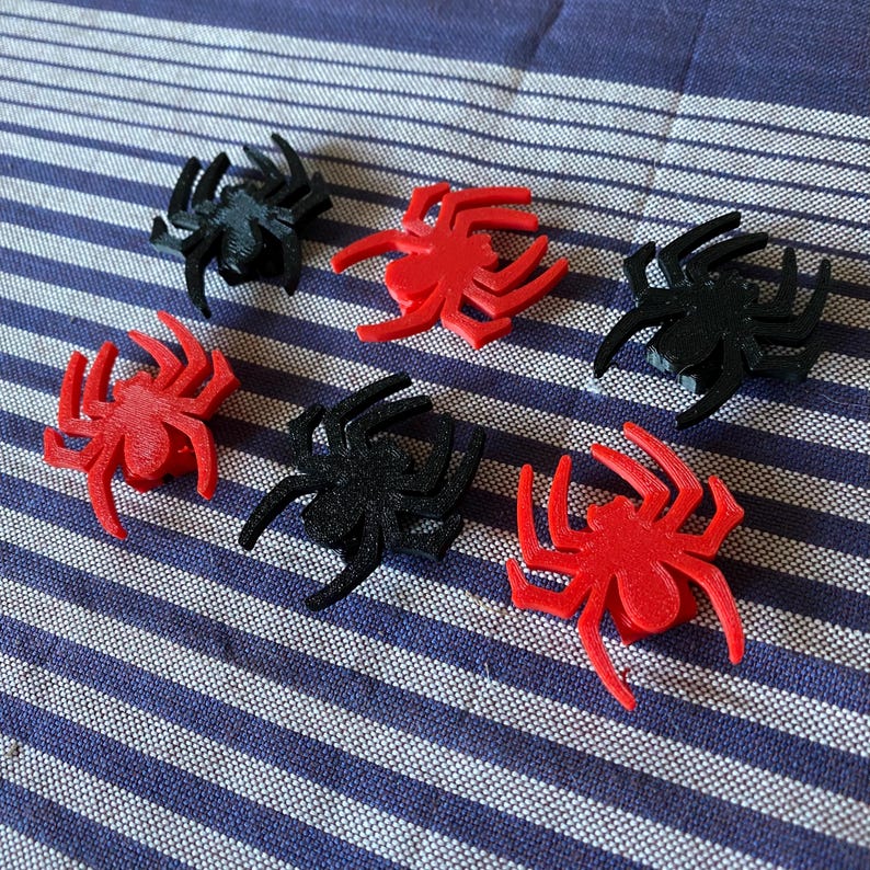spider themed bike decorations for a bicycle wheel - red and black