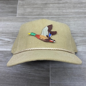 Parche de pato Mallard en sombrero de cuerda de pana color canela