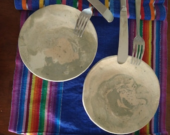 Set of two hand built ceramic plates