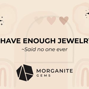 May include: A light beige graphic with the text "I HAVE ENOUGH JEWELRY ~Said no one ever." The image includes decorative elements like hearts, stars, and a logo for Morganite Gems.