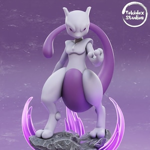 May include: A purple and white Pokemon figurine of Mewtwo standing on a gray rock base with purple glowing flames. The base has a black circle with a Pokeball and the text "N°150".