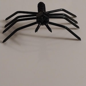 Walking Spider made out of metal bolts nails welded art metal art Halloween holiday decoration