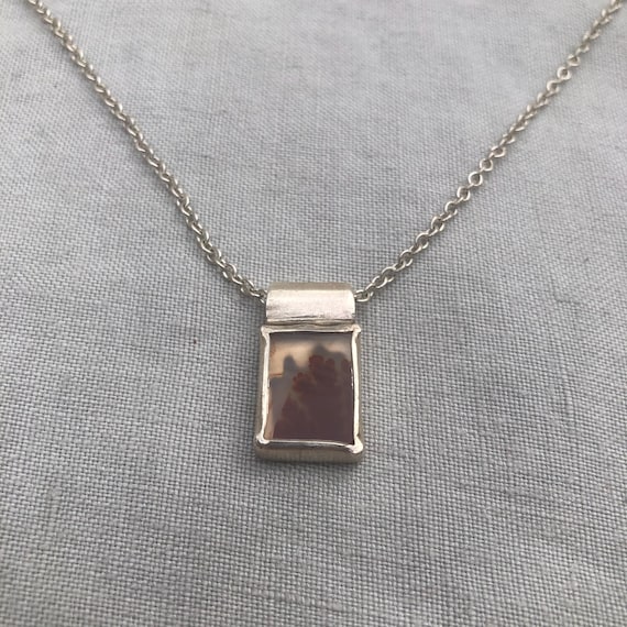 Dendritic agate pendant in argentium sterling silver // Red picture agate with open back
