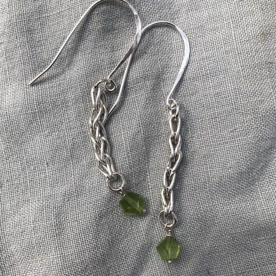 Loop-in-loop earrings in argentium sterling silver with geometric apple-green Arizona peridot