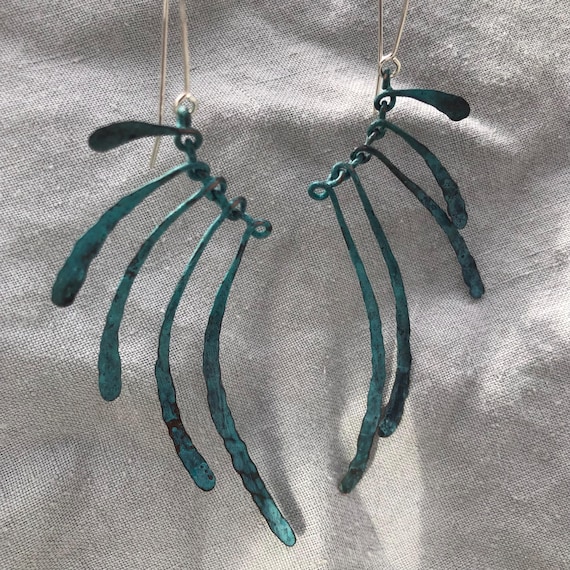 Bare bones earrings in copper with blue-green verdigris patina