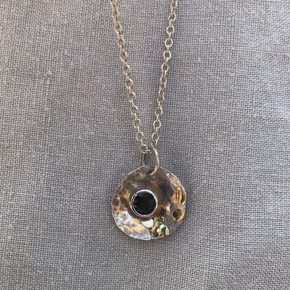 Natural earth-mined sapphire pendant in argentium silver and 24 karat gold