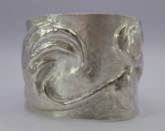 Scrollwork cuff in chased and repoussé argentium sterling silver