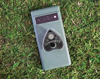 Agarre para teléfono con planchette de Ouija