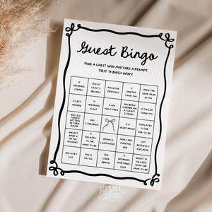 Juego de bingo para invitados a la despedida de soltera con borde ondulado negro y moños, plantilla de tarjeta de juego editable para invitados a la despedida de soltera She's Tying The Knot