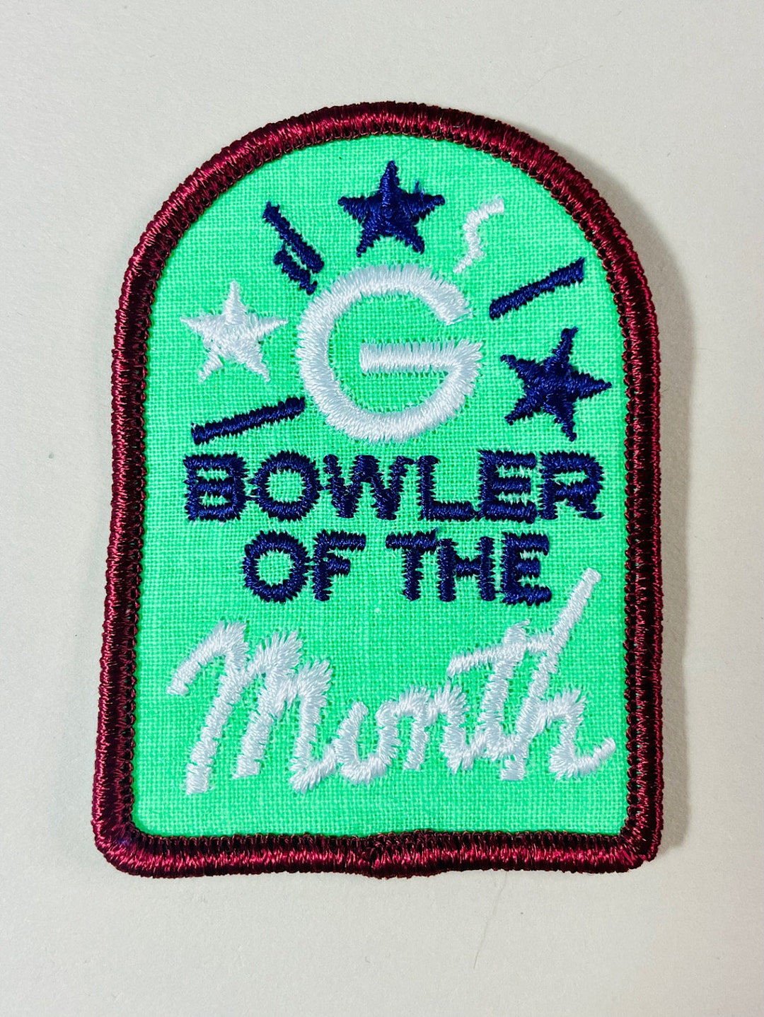 thumbnail image 2 of Funny Iron-On Patch - Tight Up Bowler App Image With Middle Finger - Unbranded Akachafactory 2 of 5