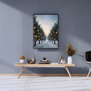 May include: A framed print of a snowy winter scene with a path lined by trees decorated with golden lights.