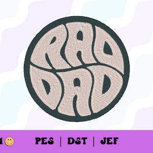 May include: A round, dark blue embroidered patch with the text "RAD DAD" in a retro, wavy font. The text is white and the background is a light beige.