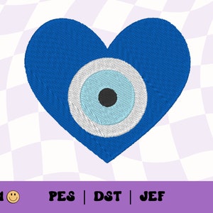 May include: Blue heart-shaped embroidery design with a white and blue evil eye in the centre.