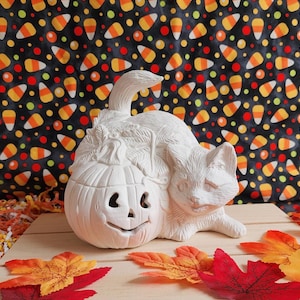 Ceramic Bisque Cat with Pumpkin Lamp. Light kit not included.