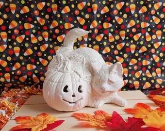 Ceramic Bisque Cat with Pumpkin Lamp. Light kit not included.