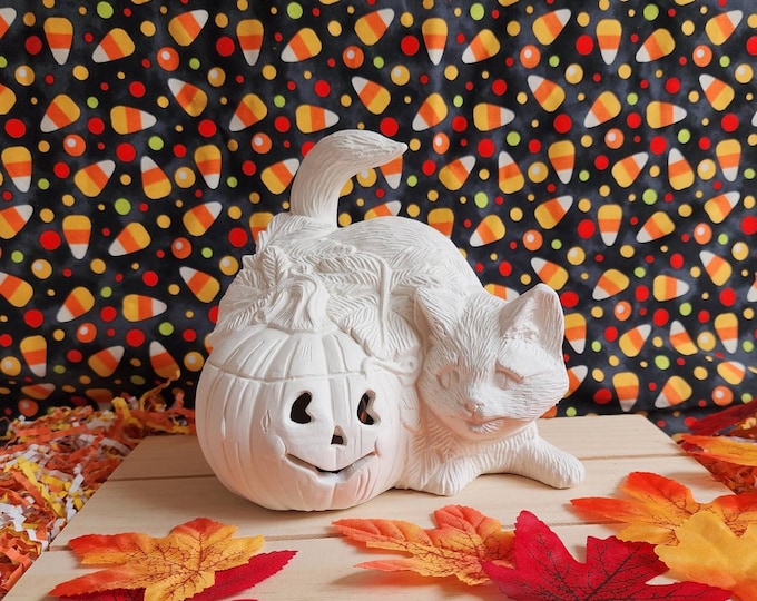 Ceramic Bisque Cat with Pumpkin Lamp. Light kit not included.