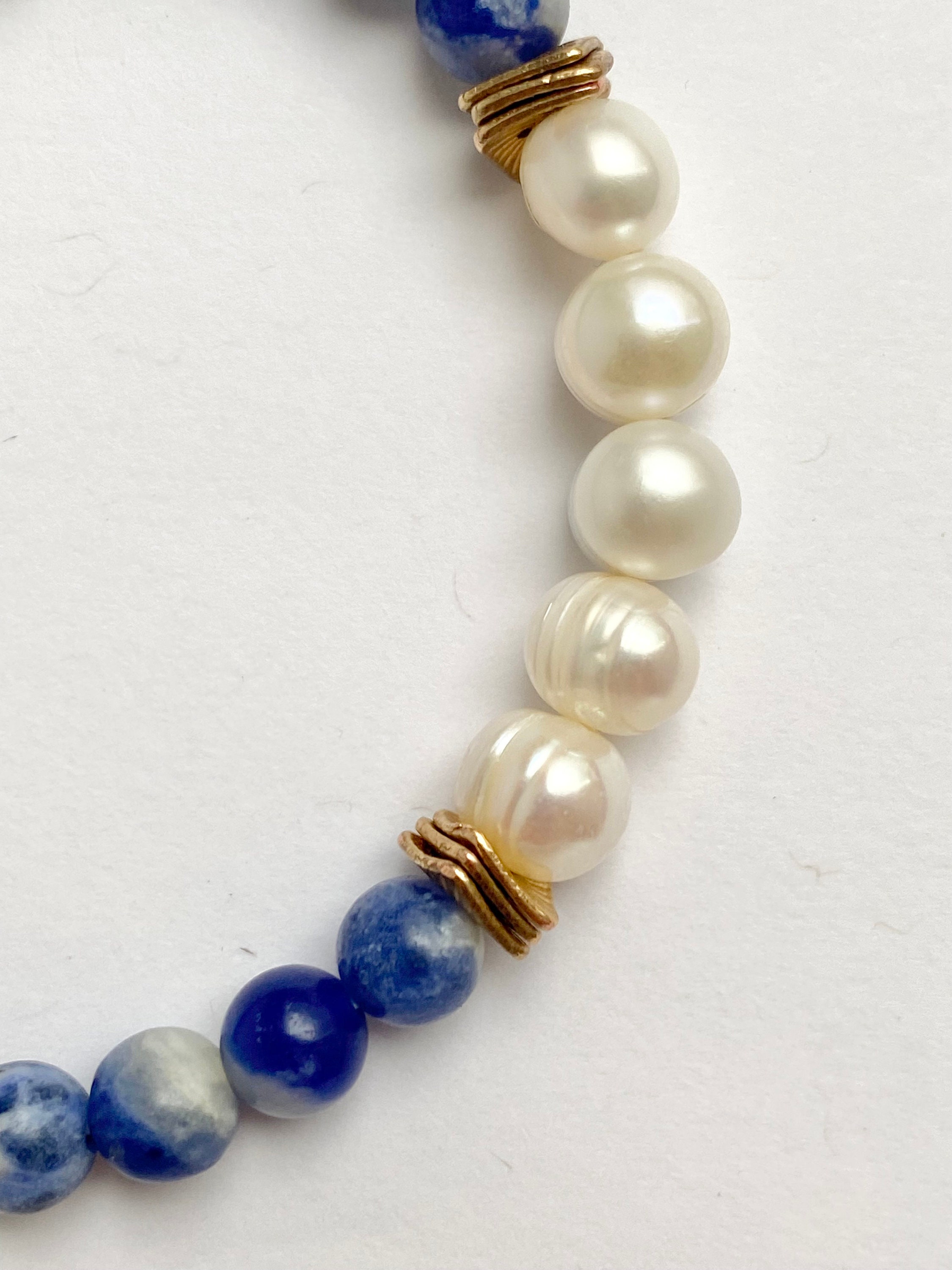 Child's rubber/clay bead bracelet with clasp and nautical charm