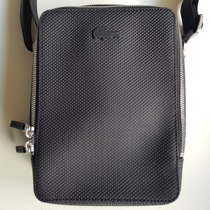 Bolso bandolera unisex Chantaco de piel negra con cremallera vertical