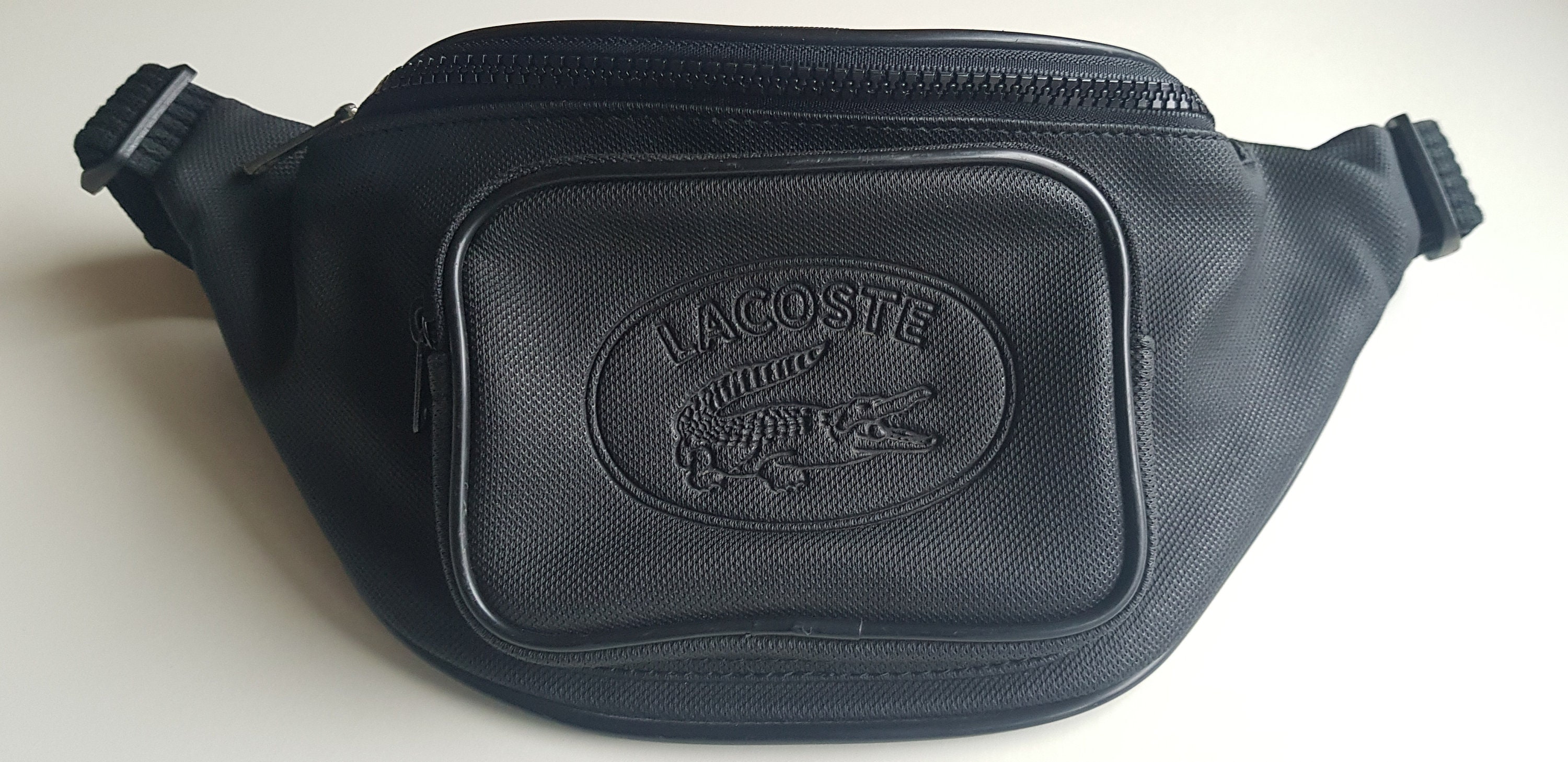 Waist bag sales supreme x lacoste