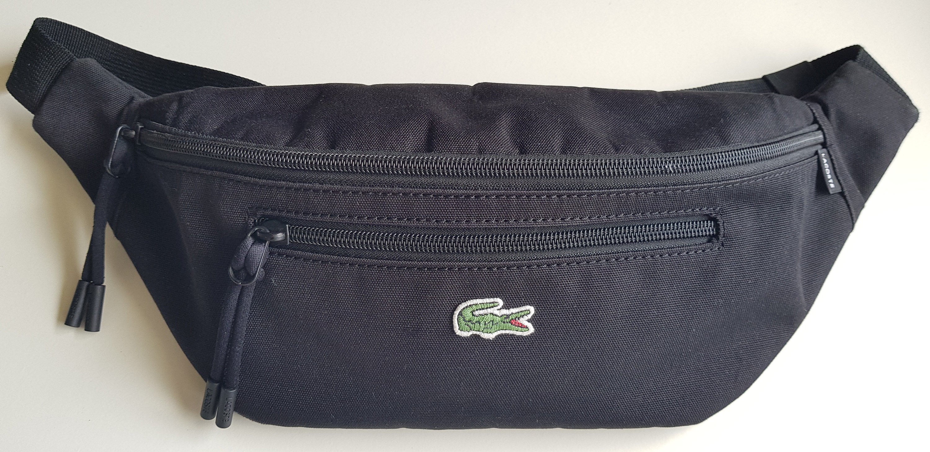 Riñonera lacoste negra hotsell