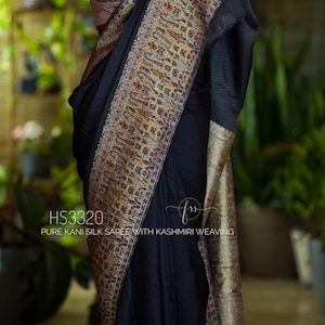 Woven with Love, Wrapped in Heritage"Kashmiri Dreams' pure Kani Silk saree embodies the timeless beauty