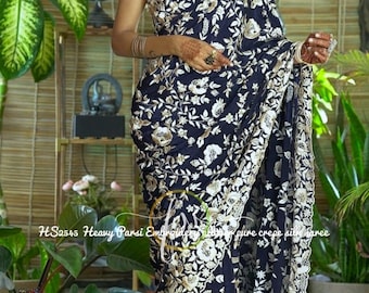 Pure crepe Parsi embroidery saree.